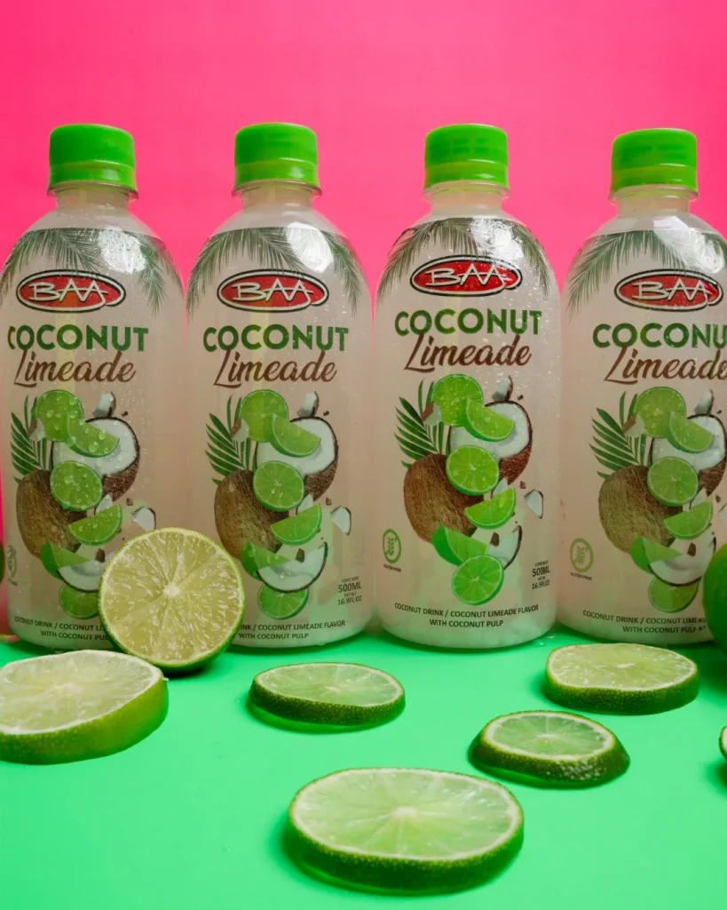 Coconut limeade bottles with fresh limes